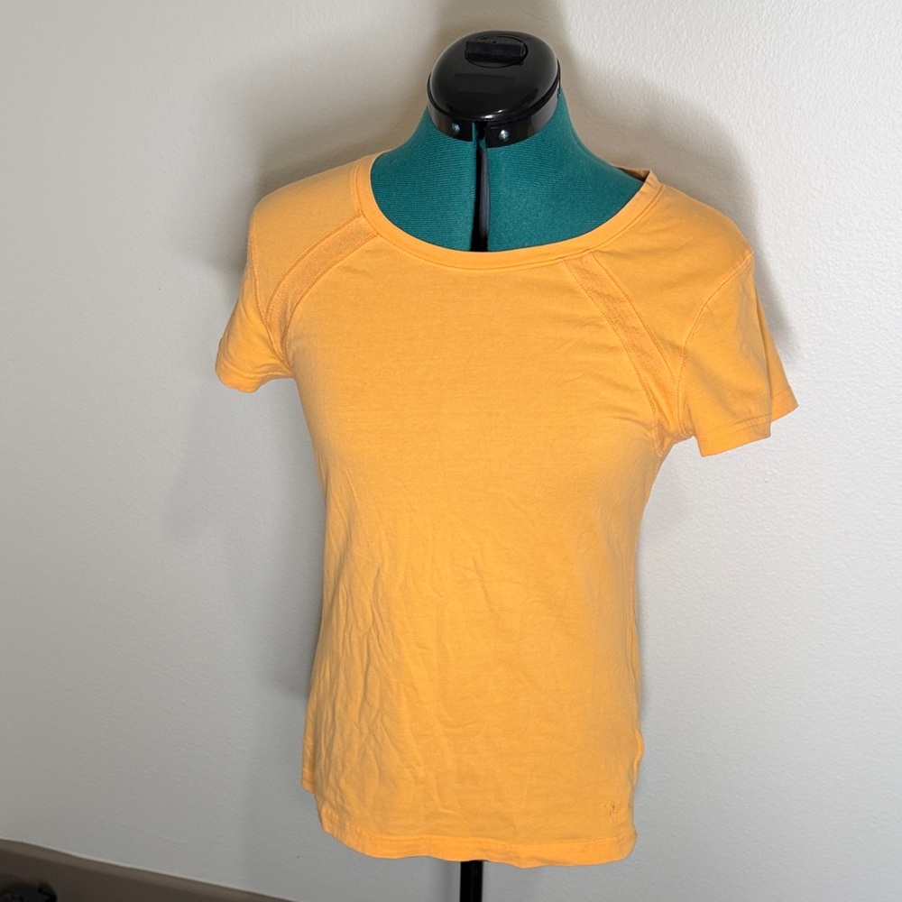 Danskin light orange short sleeve athletic shirt